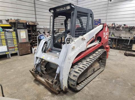 used takeuchi tl140 skid steer